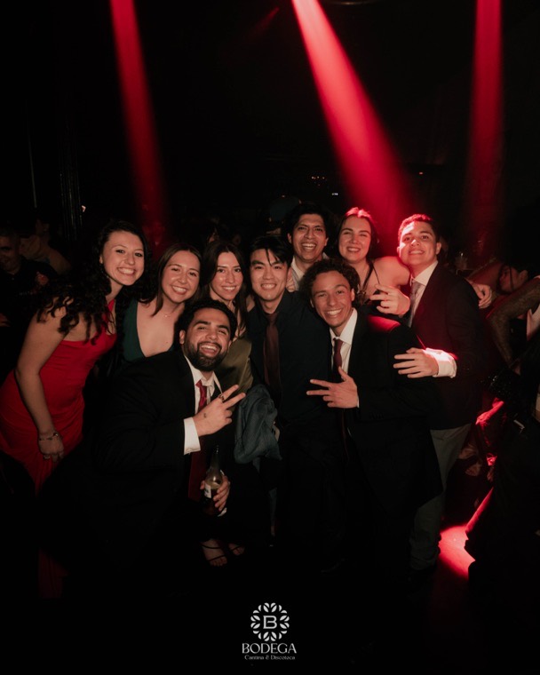 Guests celebrating together on a busy night at Bodega